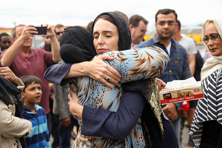WELLINGTON, NEW ZEALAND - MARCH 17: Prime Minister Jacinda Ardern hugs a mosque-goer at the Kilbirnie Mosque on March 17, 2019 in Wellington, New Zealand. 50 people are confirmed dead and 36 are injured still in hospital following shooting attacks on two mosques in Christchurch on Friday, 15 March. The attack is the worst mass shooting in New Zealand's history. (Photo by Hagen Hopkins/Getty Images)
