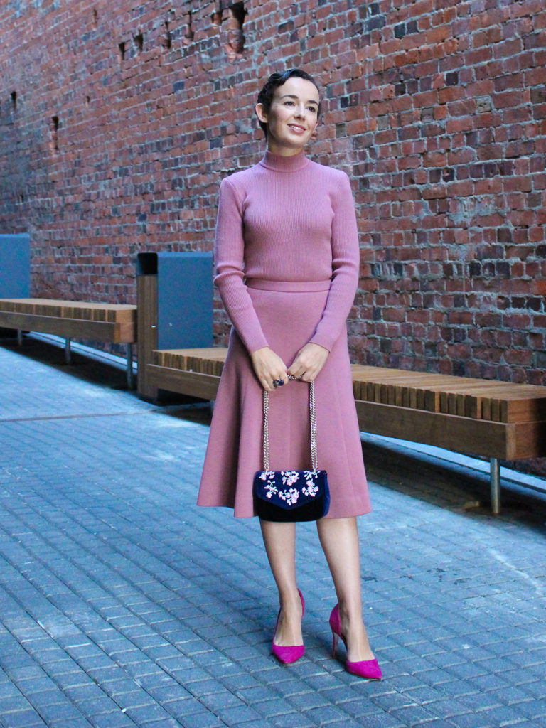 Megan Blenkarne wearing a vintage pink two piece